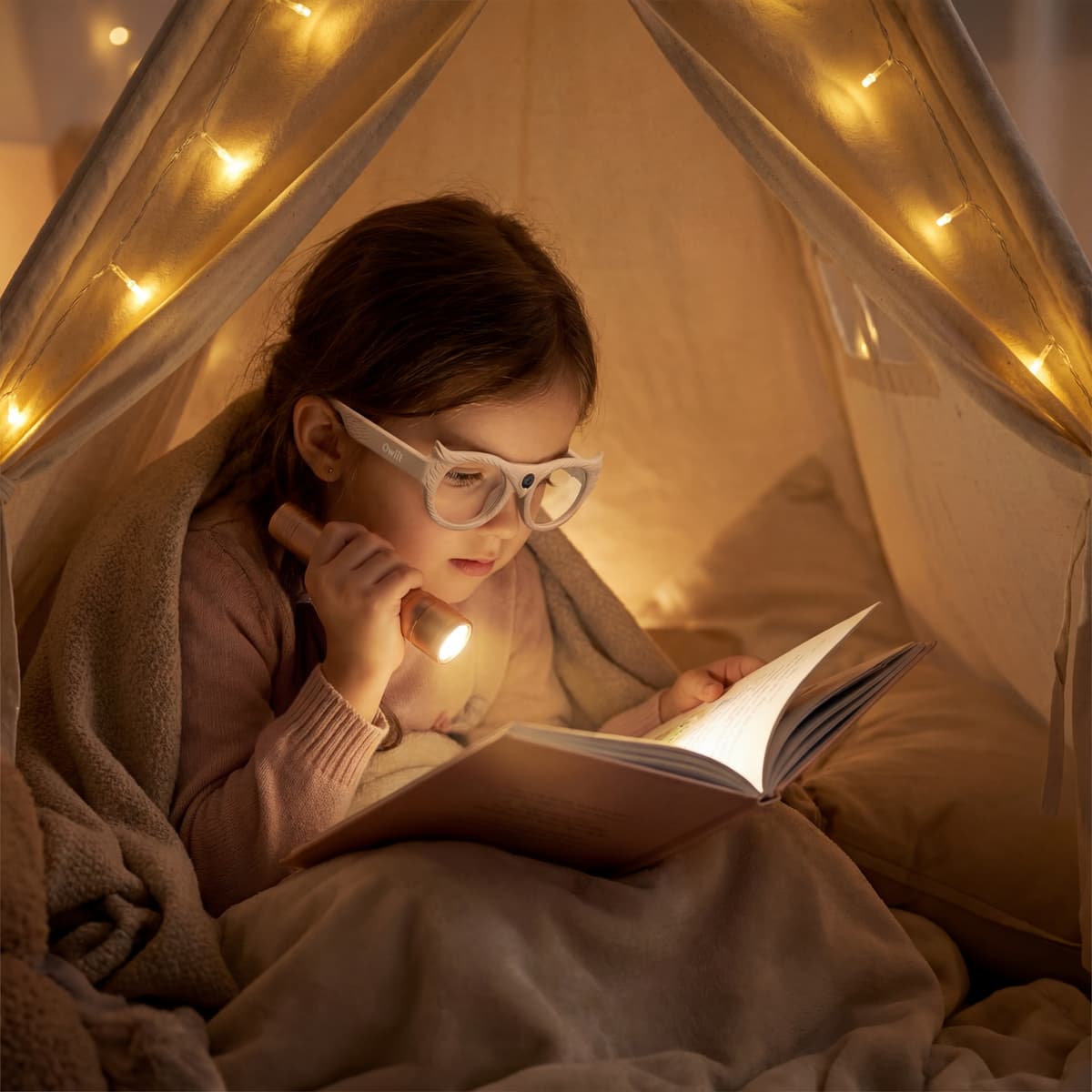 Child reading with Owlit